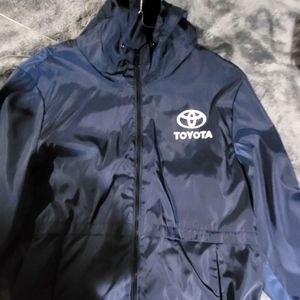 Light weight hooded rain jacket